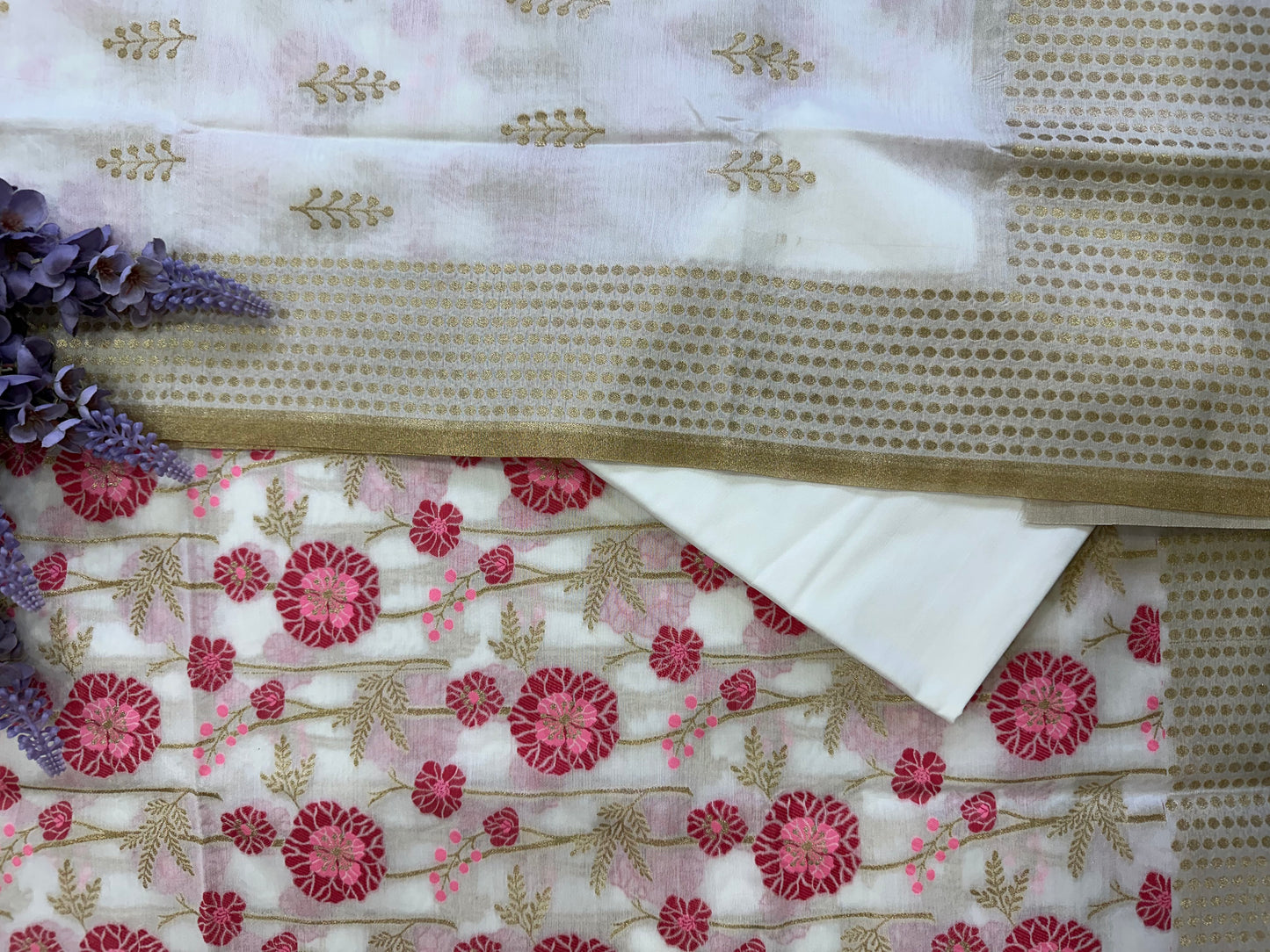 White suit with pink print